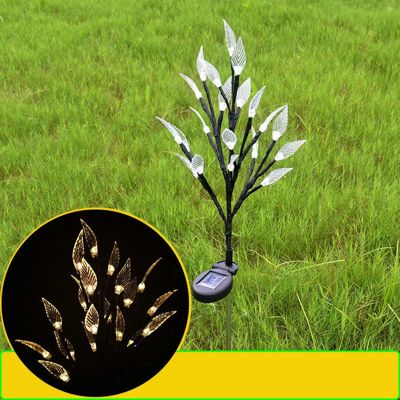 Solar-powered leaf branch garden light measuring 73cm tall with iron and plastic construction