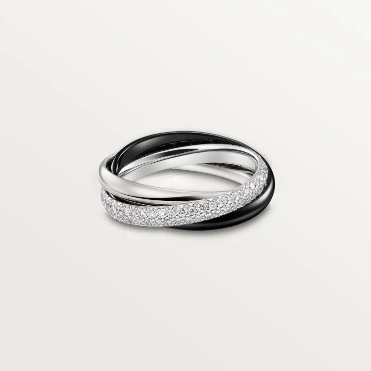 Solid silver couple rings on a hand, showing full diamond pave and plain band options in gold rose, silver, and black finishes.