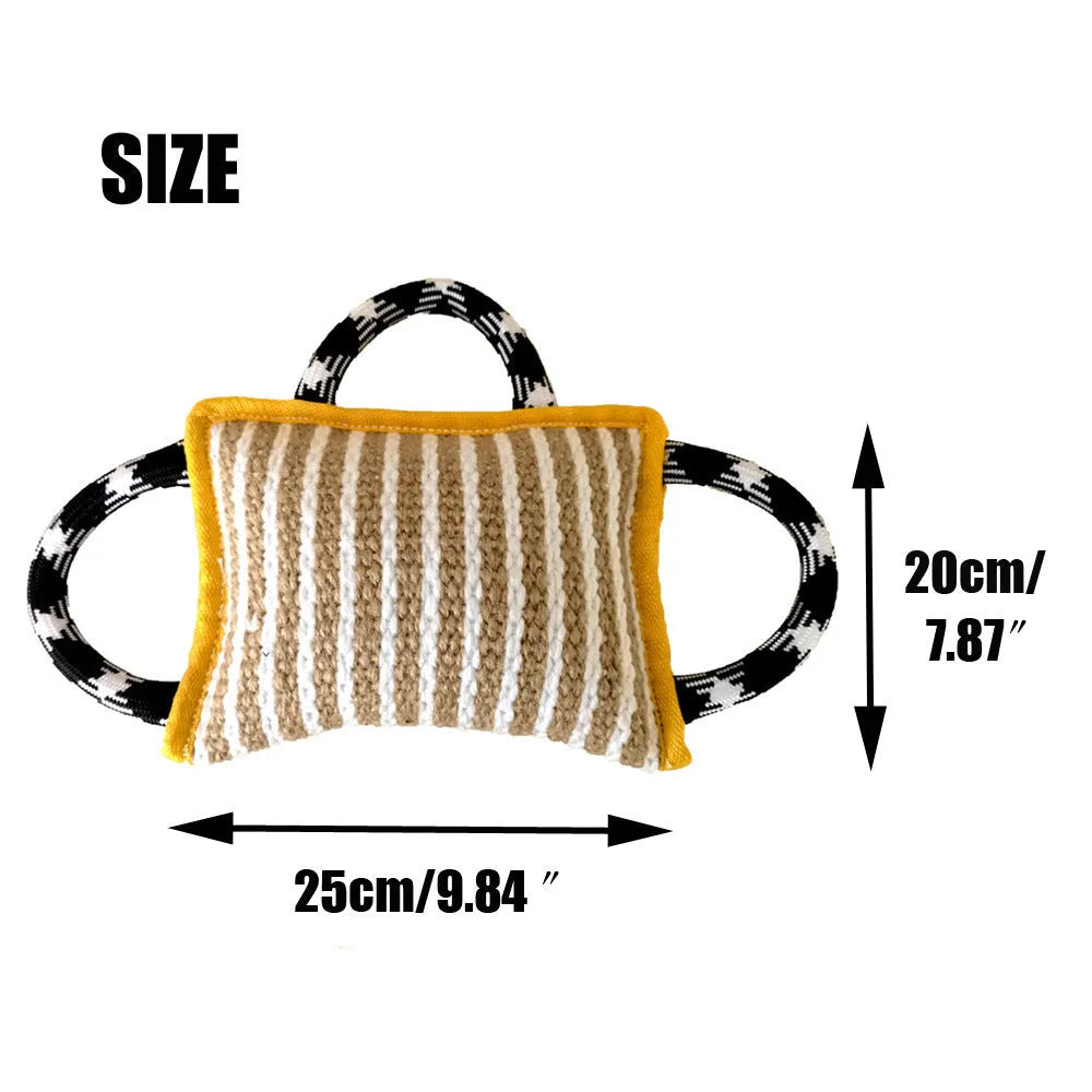 Dog tug of war toy with blue jute bite pillow and three rope handles on a wooden floor.