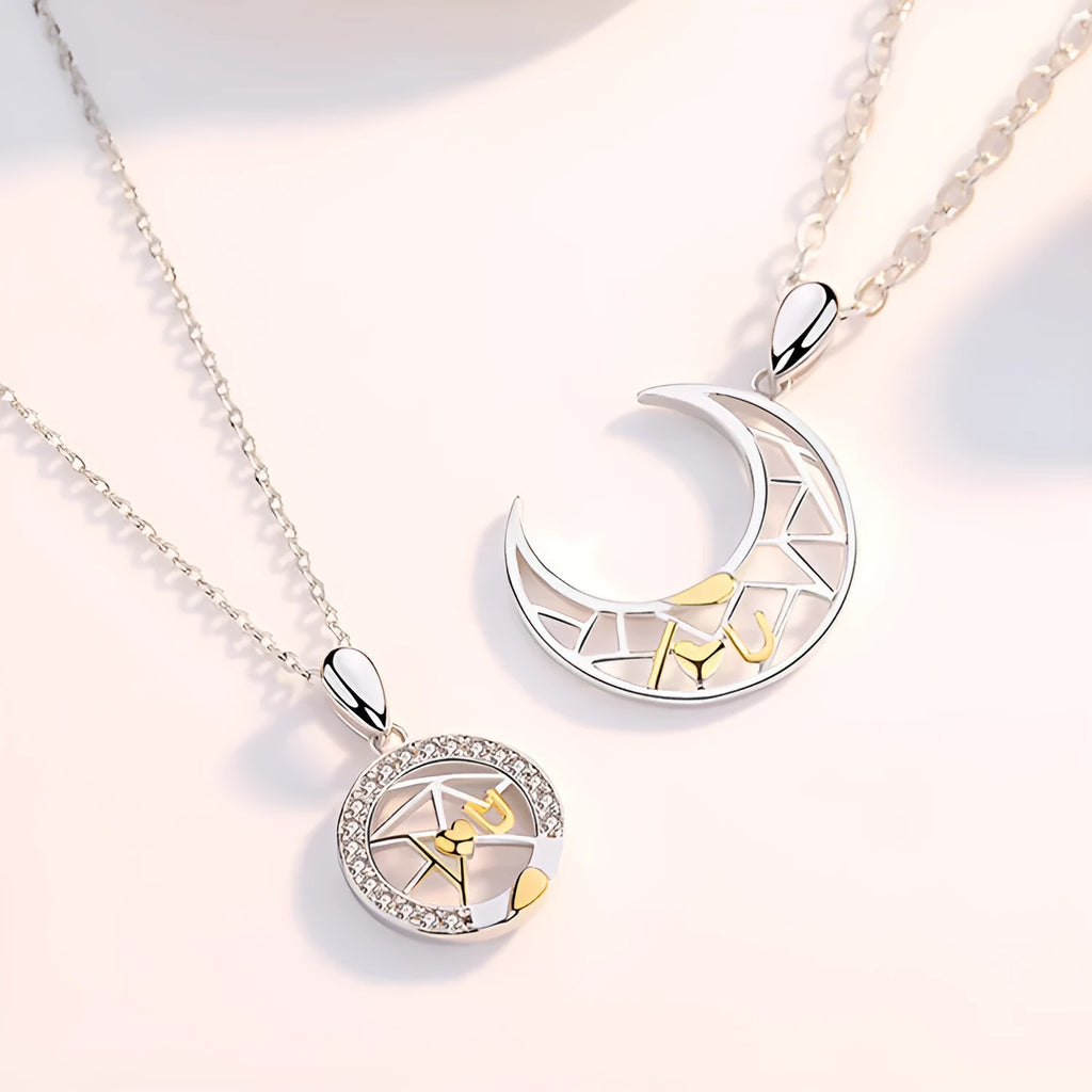 Sun and moon tooth couple necklace set with copper electroplated pendants and cross chain.