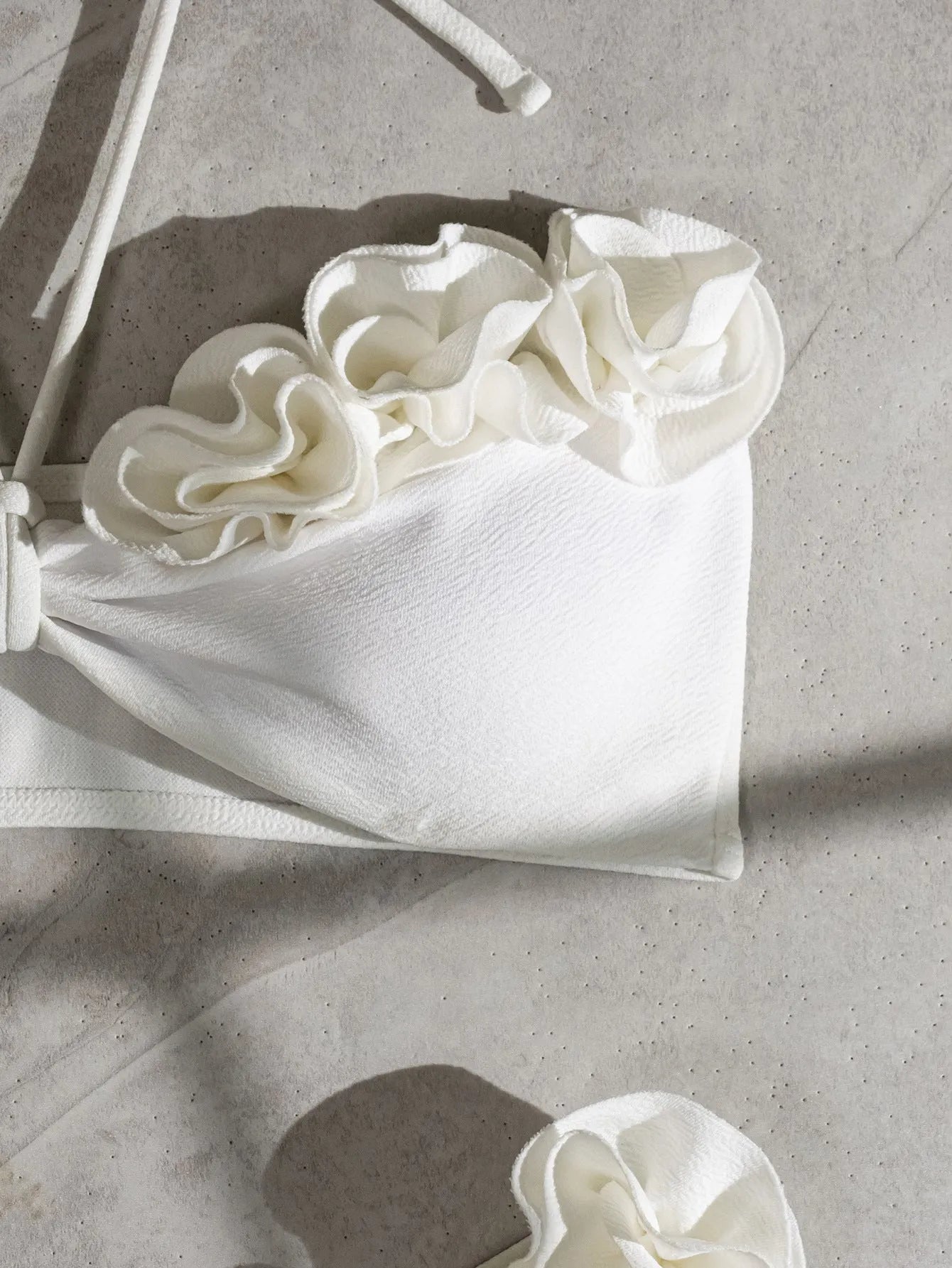White halter neck lace-up swimsuit bikini set with three-dimensional floral pattern on briefs