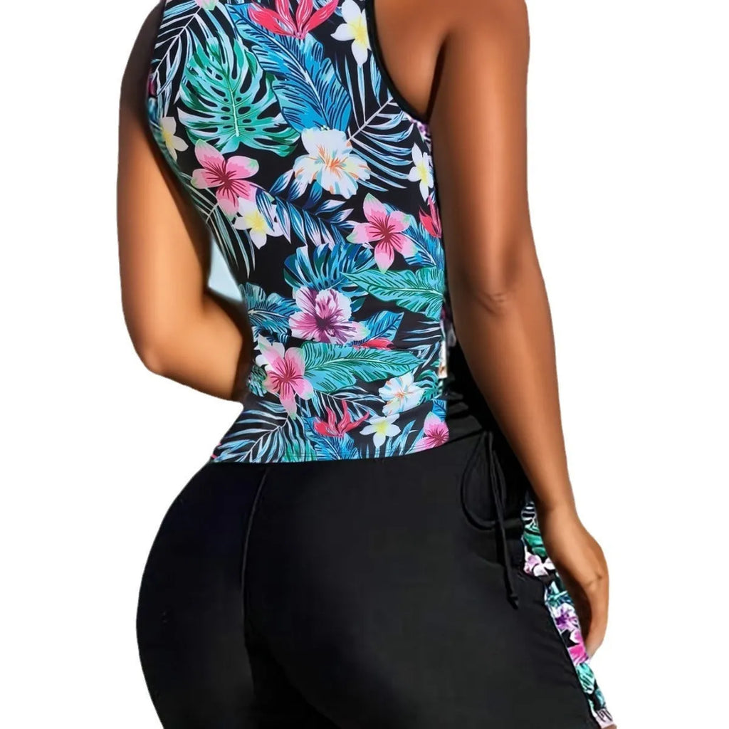 Women's plus size floral print high-waisted bikini swimsuit in navy blue.