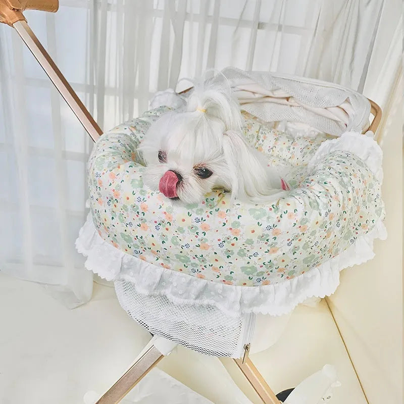 Pure cotton pet stroller three-piece set showing removable anti-dirty towel, cushion, and pillow in a floral pattern.