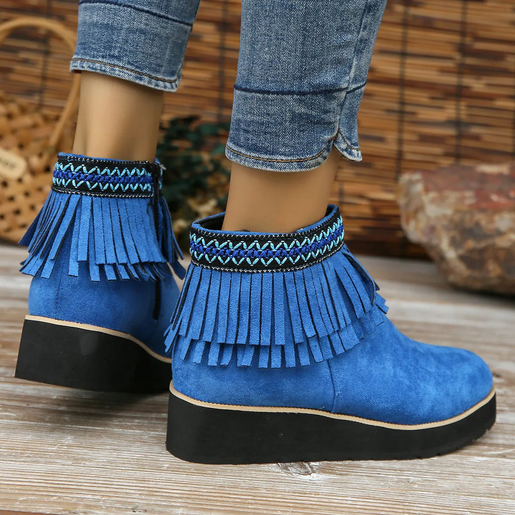 Women's dark brown suede wedge boots with a thick platform sole and side zipper.