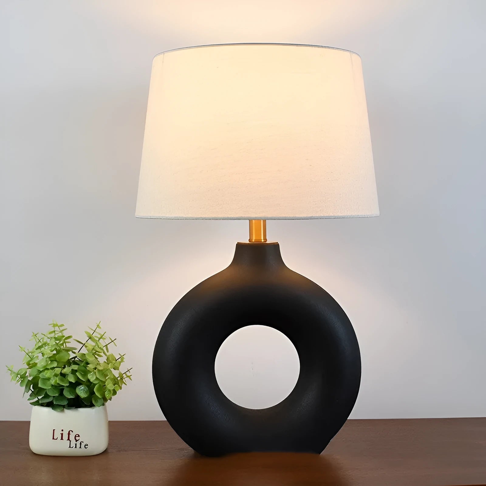 Small white Japanese-style ceramic pottery pot table lamp with a button switch, 52cm tall.