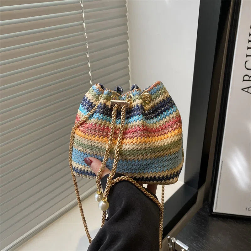 Women's straw woven bucket bag with diamond chain, colour-block plaid pattern, single shoulder strap, and multicolor finish