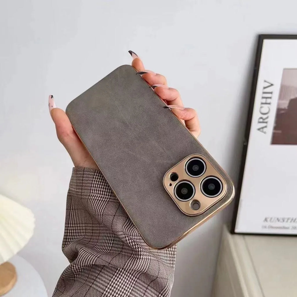 Leather texture TPU phone case on an iPhone, showing grey colour and precise port cutouts.