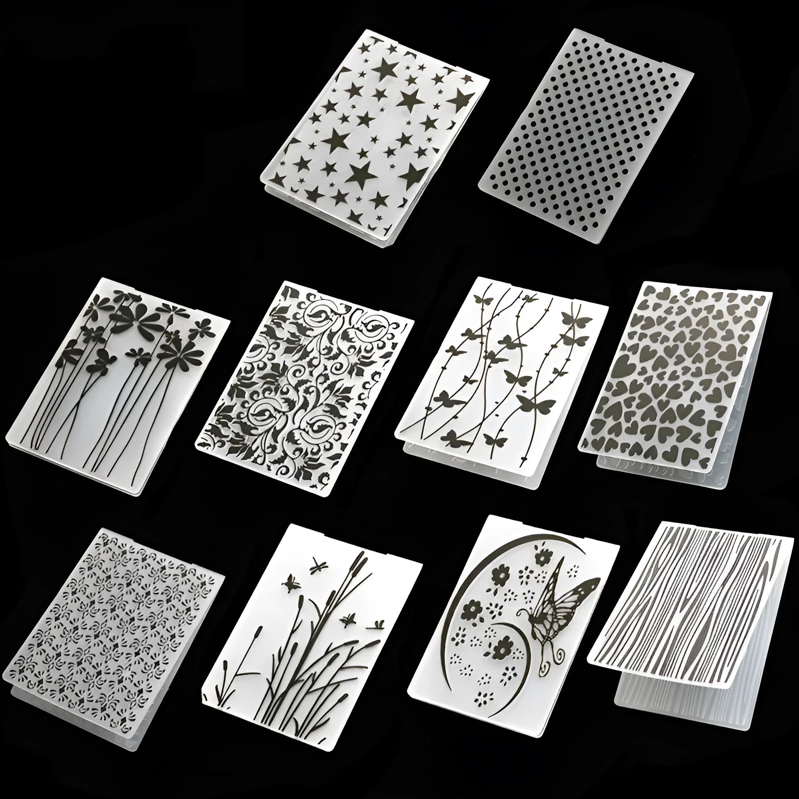 Plastic cake decorating mould showing windmill and flower shapes, folding size 14.5 by 10.5 cm.