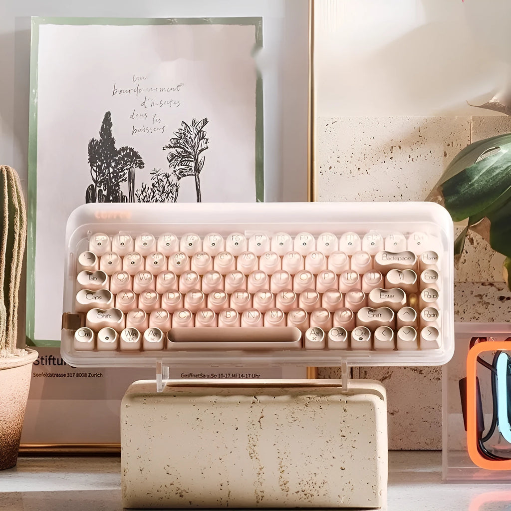 Liquid foundation colour wireless mechanical keyboard, mouse, pick-up lamp, and Bluetooth calculator set on a desk.