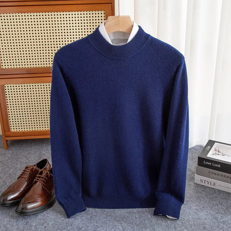 Man wearing a loose-fit half-collar wool sweater in a neutral colour, showing the knitted texture and relaxed fit.