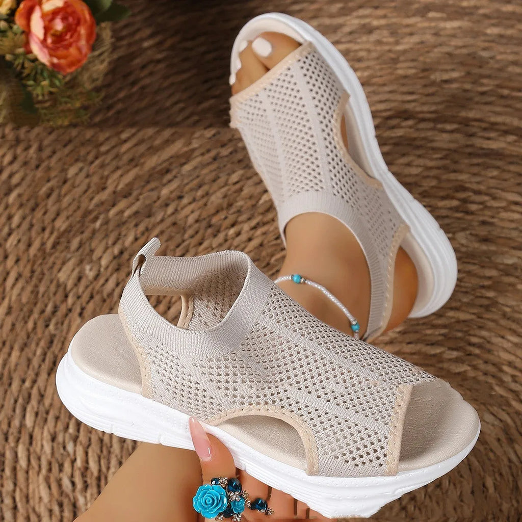 Women's platform sports sandals in black, white, or pink with rubber sole and mesh lining