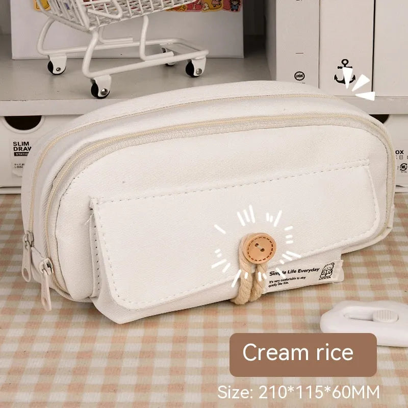 Green canvas pencil case with button closure, large capacity for pens.