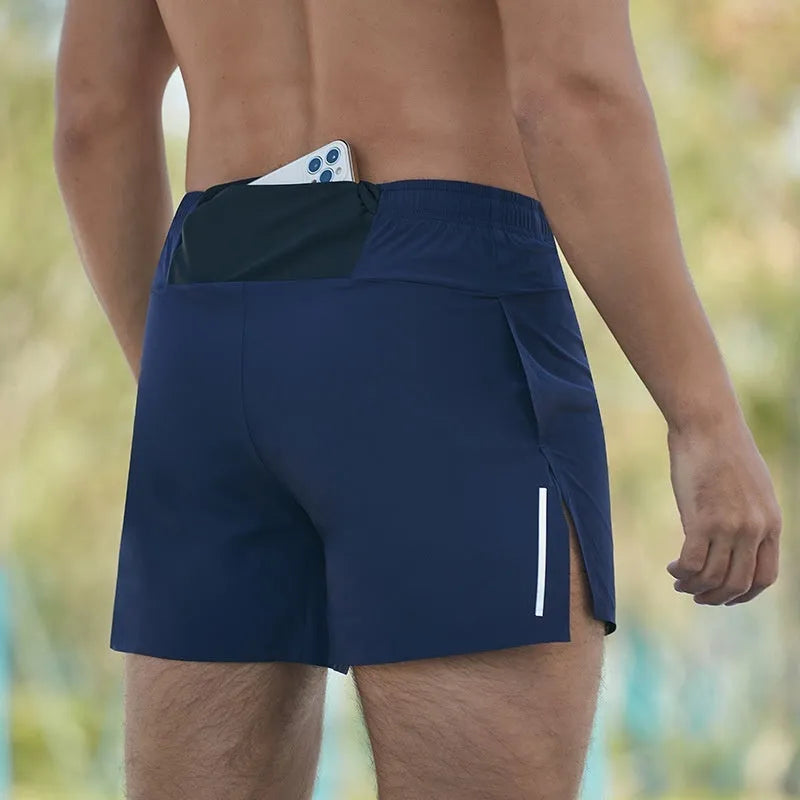 Men's black high-waist running shorts with loose fit and nylon lining for off-road and marathon running.