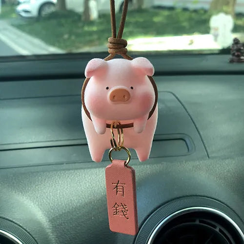 Cute cartoon pig resin figurine car dashboard ornament in one of eight available styles.