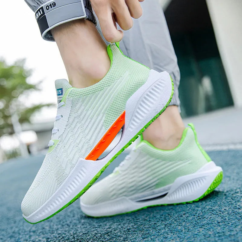 Men's blue casual mesh sports shoes with round toe and cloth upper.
