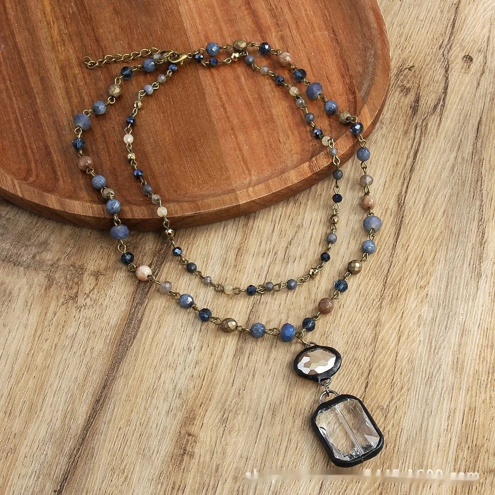 Tribal style two-layer necklace with glass pendant and semi-precious stones on adjustable chain