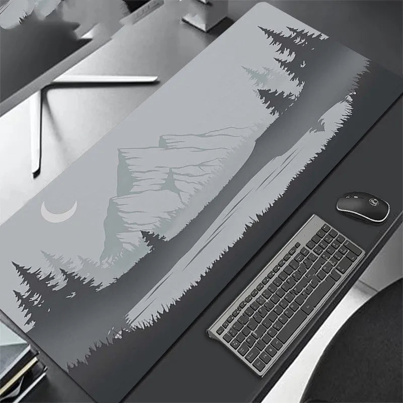 All black extra long mouse pad with precision overlock stitching on a desk