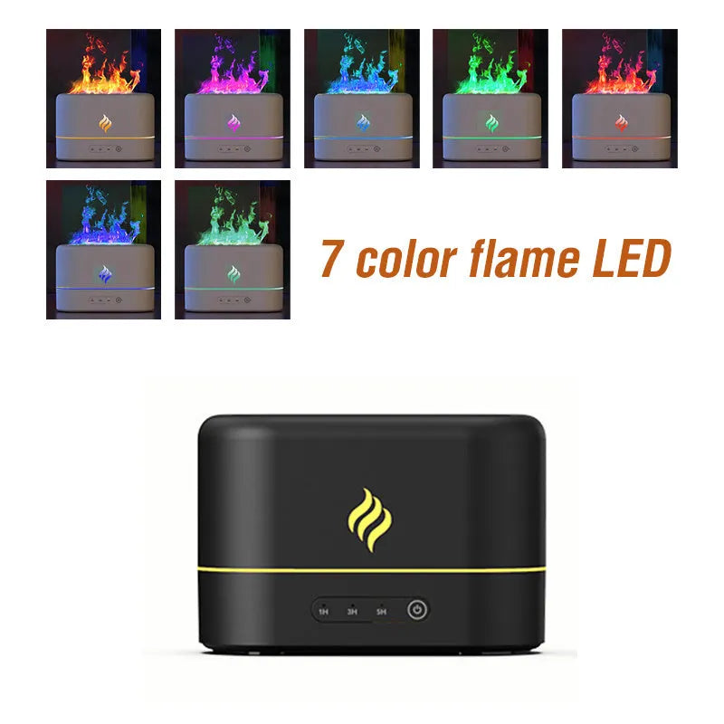 Black and white seven-colour flame effect USB aromatherapy humidifier on a surface, showing mist output.