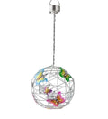 White outdoor solar ball light with random colour butterfly decorations on a garden lawn