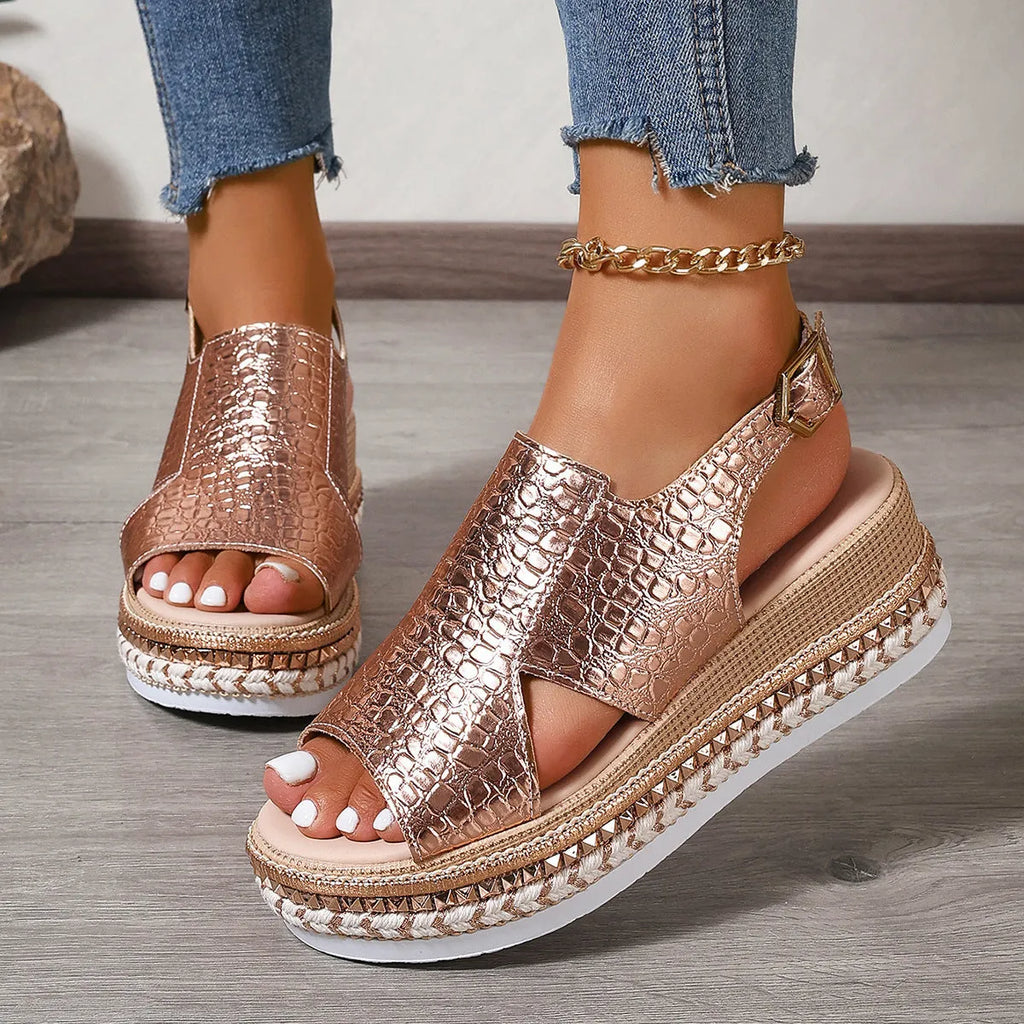 Gold women's Roman shoes with round toe, hollow-out design, and adjustable ankle buckle