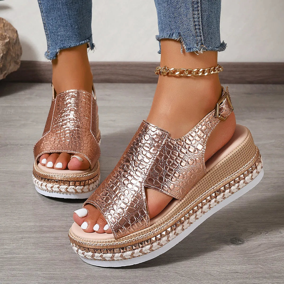 Gold women's Roman shoes with round toe, hollow-out design, and adjustable ankle buckle