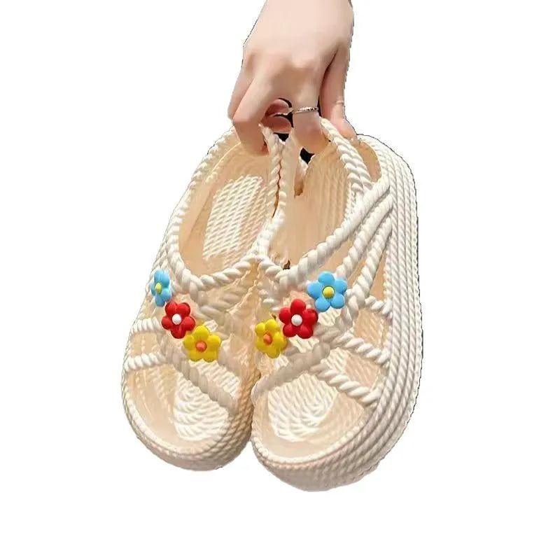 Beige PVC sandals with sunflower decoration and non-slip sole shown in size 36-37