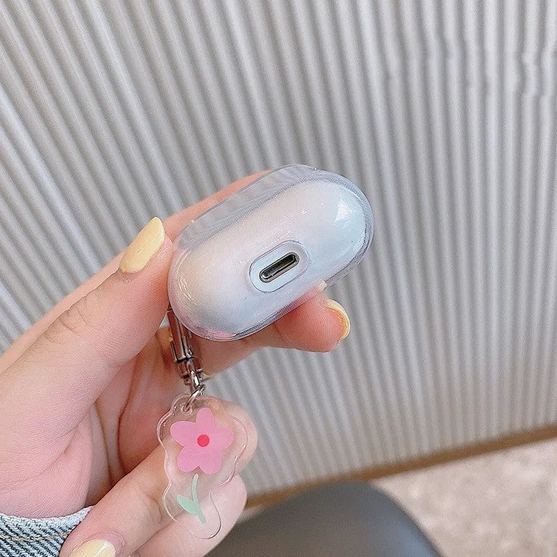 Transparent TPU soft shell case for AirPods Pro with matching pendant on white background