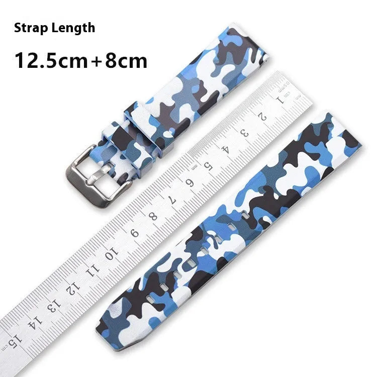 Blue camouflage silicone watch strap showing flat head design and texture.