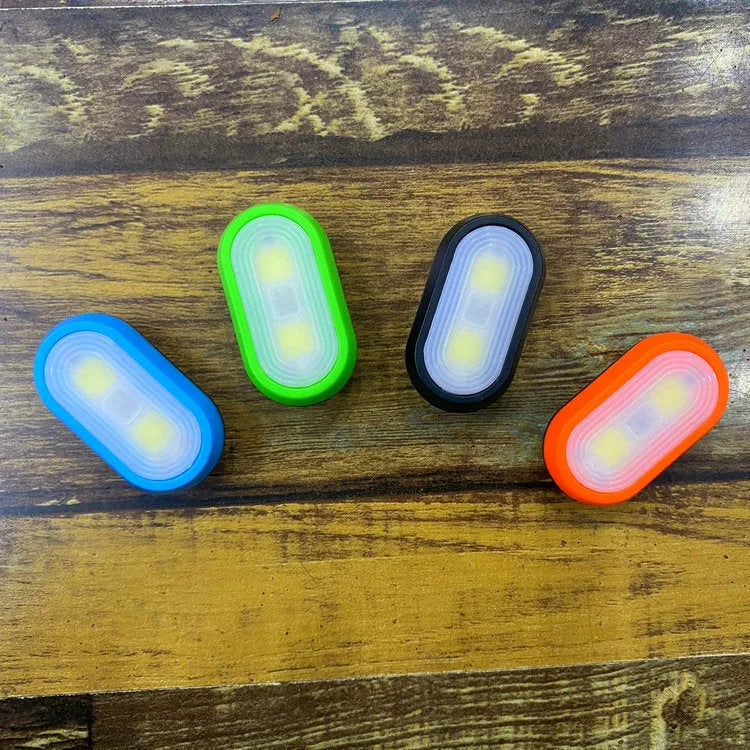 Compact keychain light with 3W LED in black, blue, green, and orange ABS casing