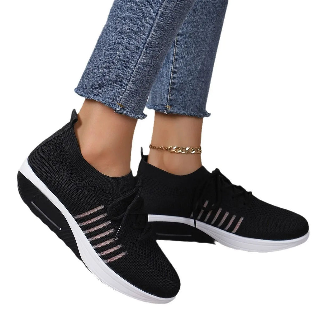 Women's lace-up flat shoes with mesh upper and platform heel in black, dark blue, or red colour options