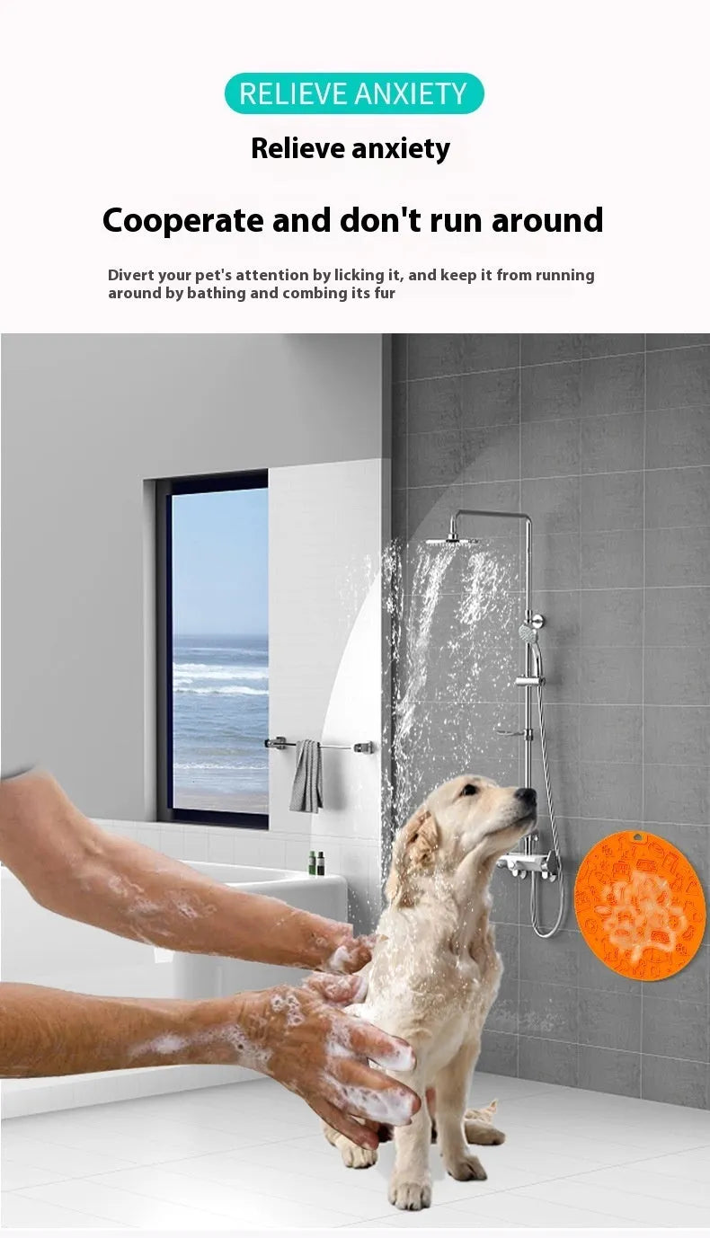 Round silicone pet licking mat in blue colour with suction cup base on a tile floor.