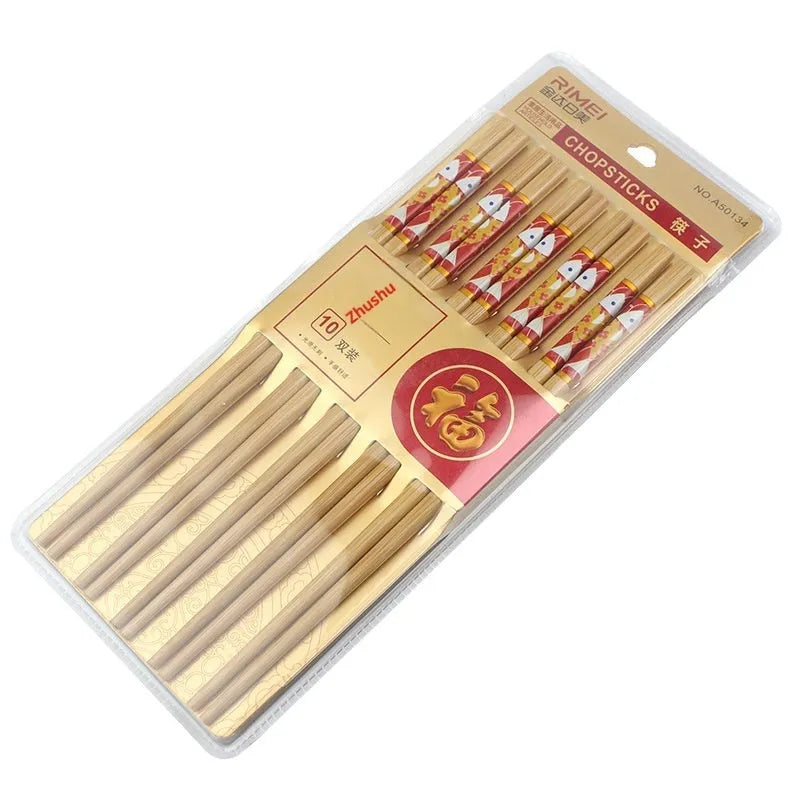 10 pairs of solid colour bamboo chopsticks on a plain surface, household kitchen use