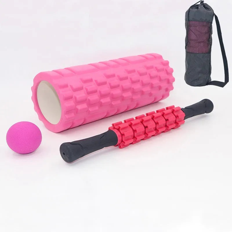 Black six-piece foam massage roller stick with gear design, 33cm long.