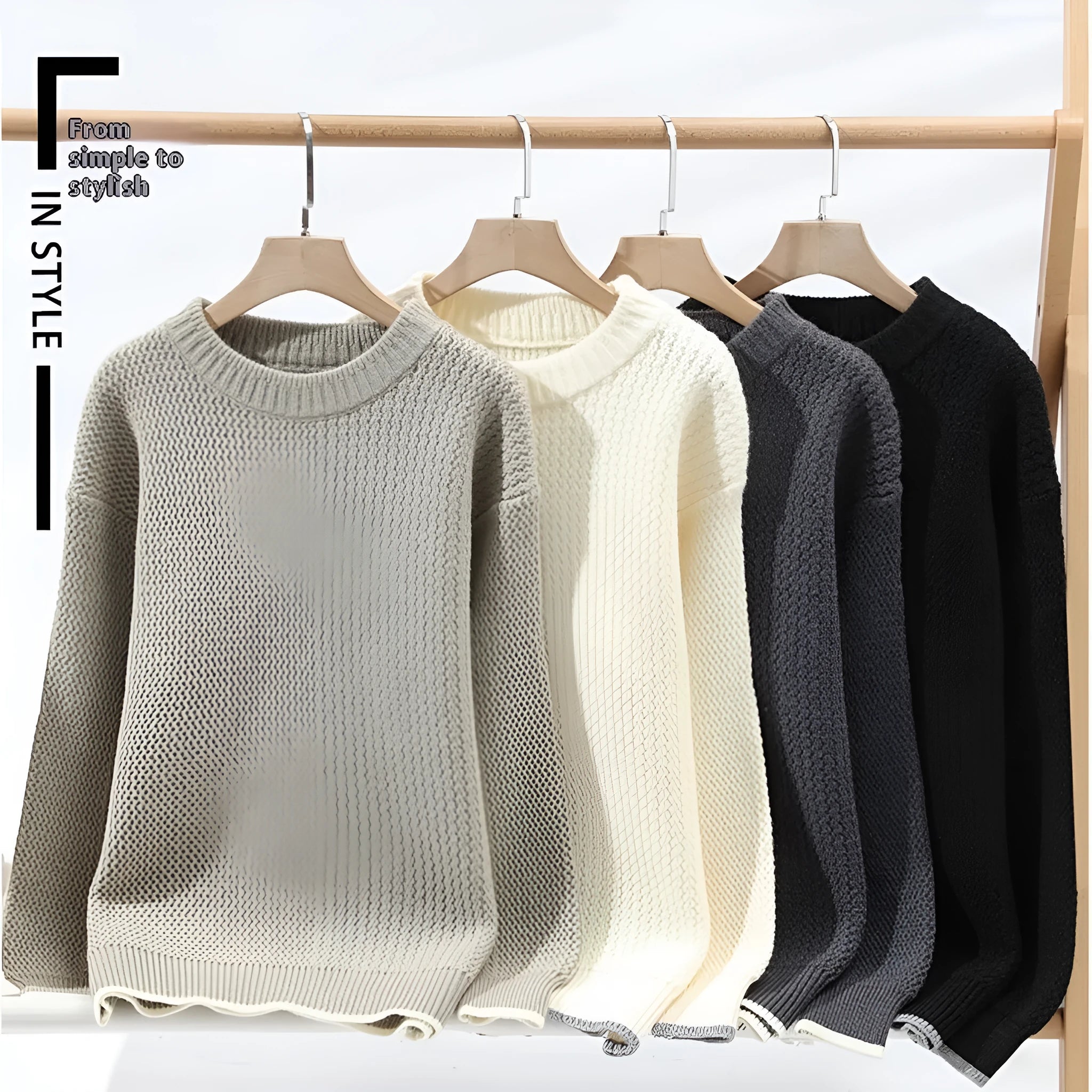 Man wearing a grey loose-fit round neck long sleeve pullover sweater.