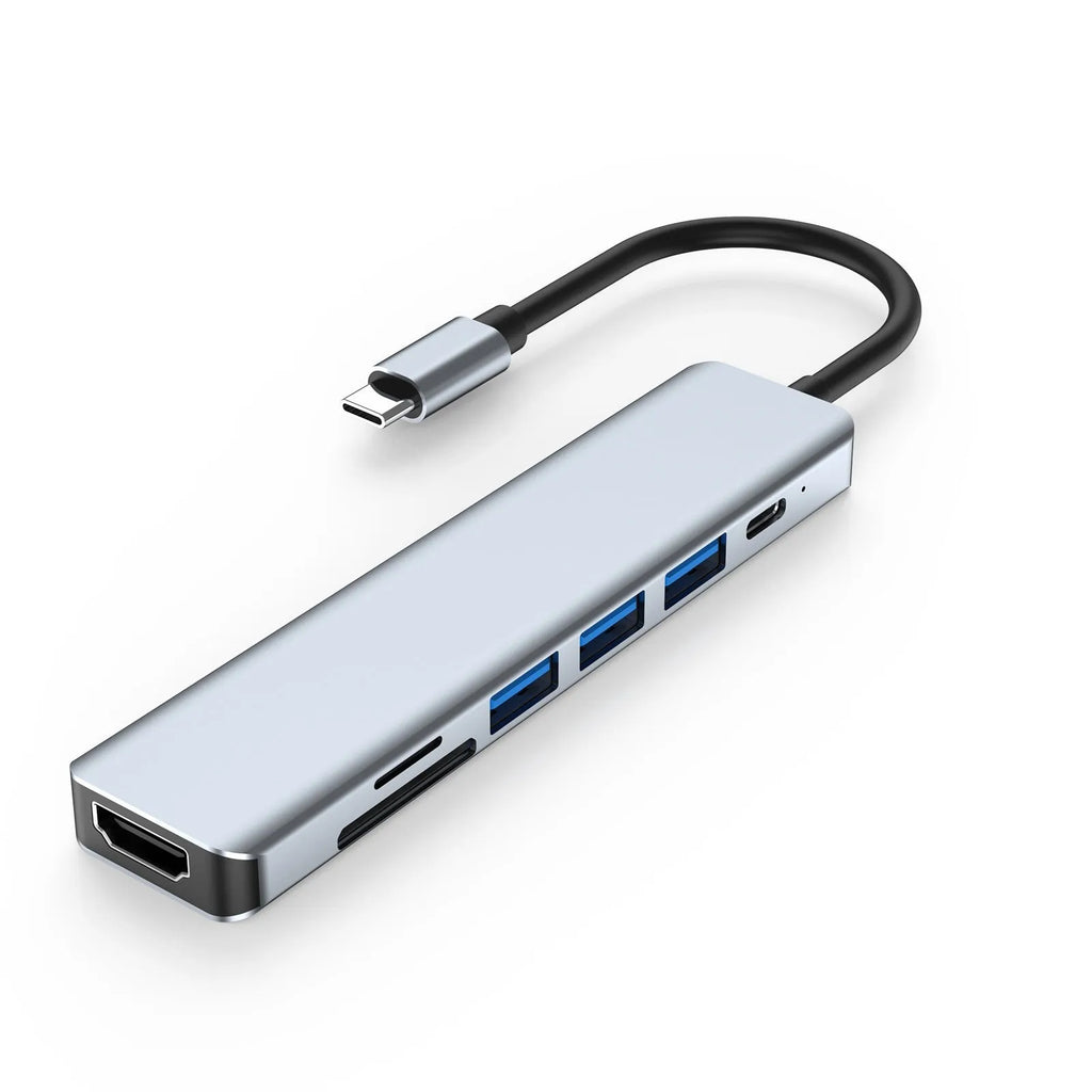 Seven-in-one Type-C USB expander hub with a short cable on a desk