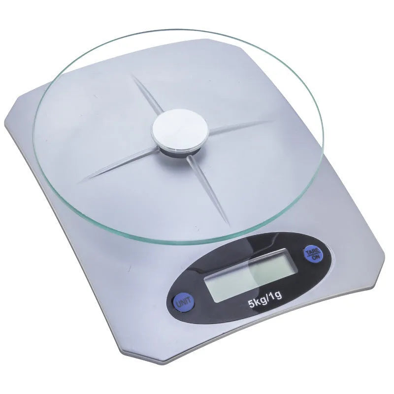 Silver white mini kitchen electronic scale, battery-powered, simple compact design for weighing