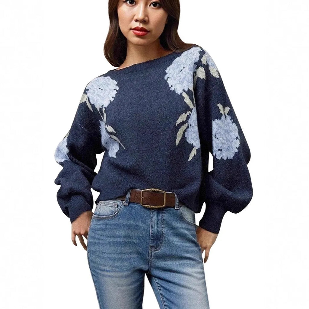 Sapphire blue women's pullover with a loose fit and an all-over floral jacquard pattern.