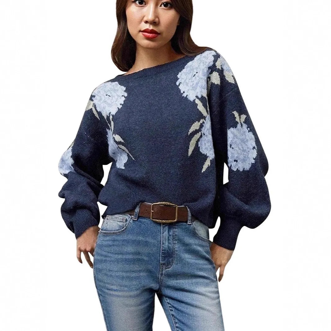 Sapphire blue women's pullover with a loose fit and an all-over floral jacquard pattern.