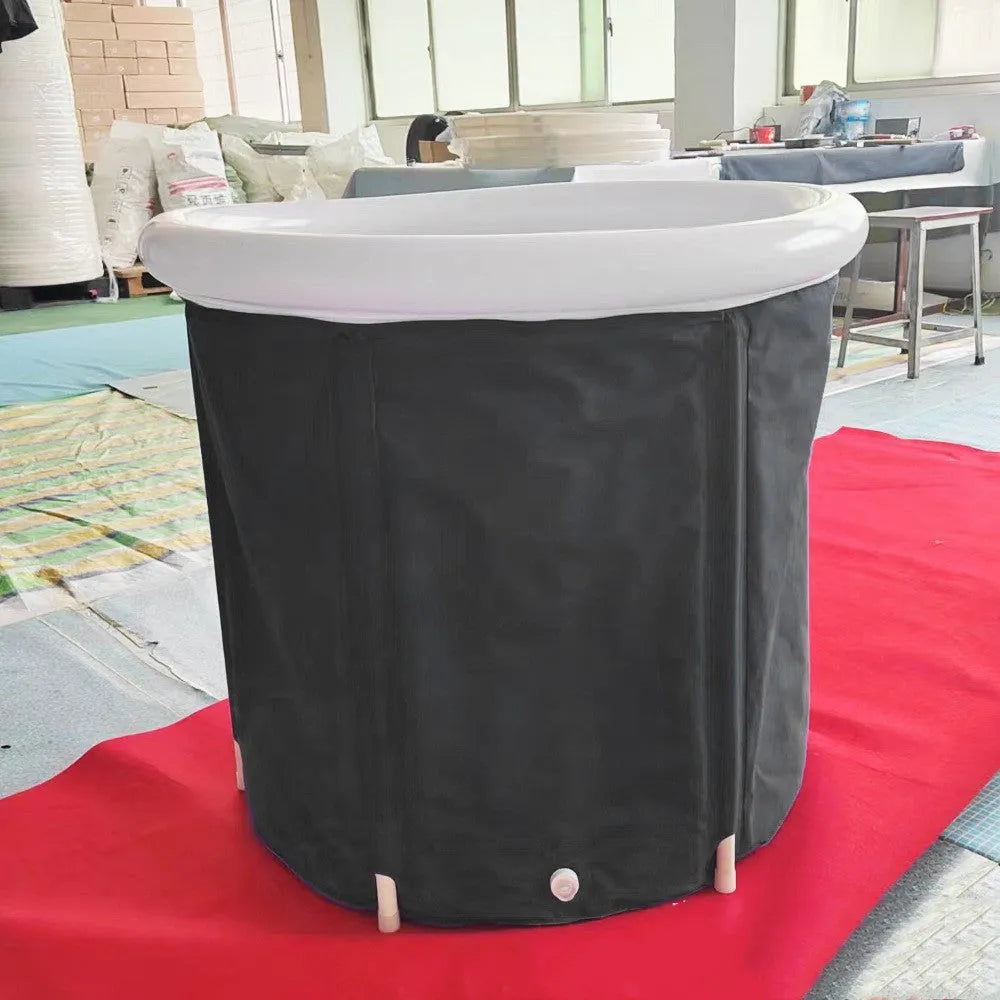 Black portable inflatable ice bath with weather lid for cold therapy recovery
