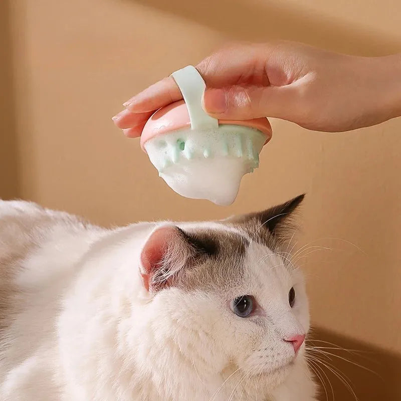 Silicone pet bathing brush with plastic handle in blue, pink, white, and yellow colour options