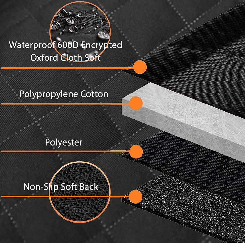 Black and orange waterproof dog car seat cover mat on a vehicle rear seat.