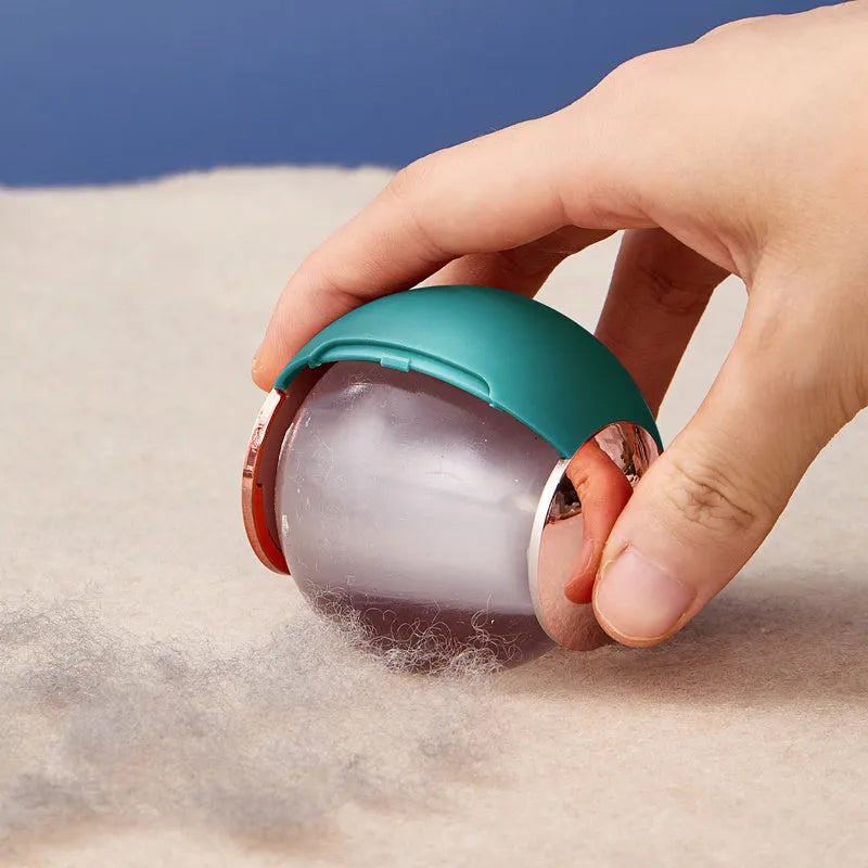 Reusable gel lint roller with sticky hair removal ball in metallic gold colour options
