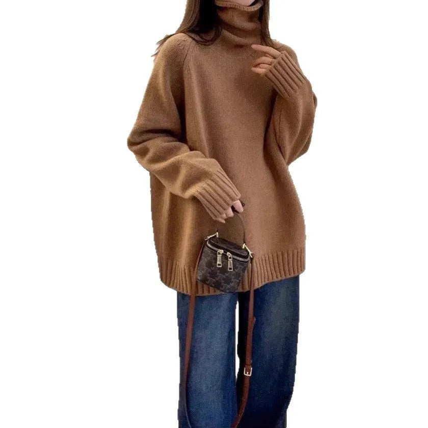 Women's loose fit black turtleneck sweater with a thick curling pile collar.