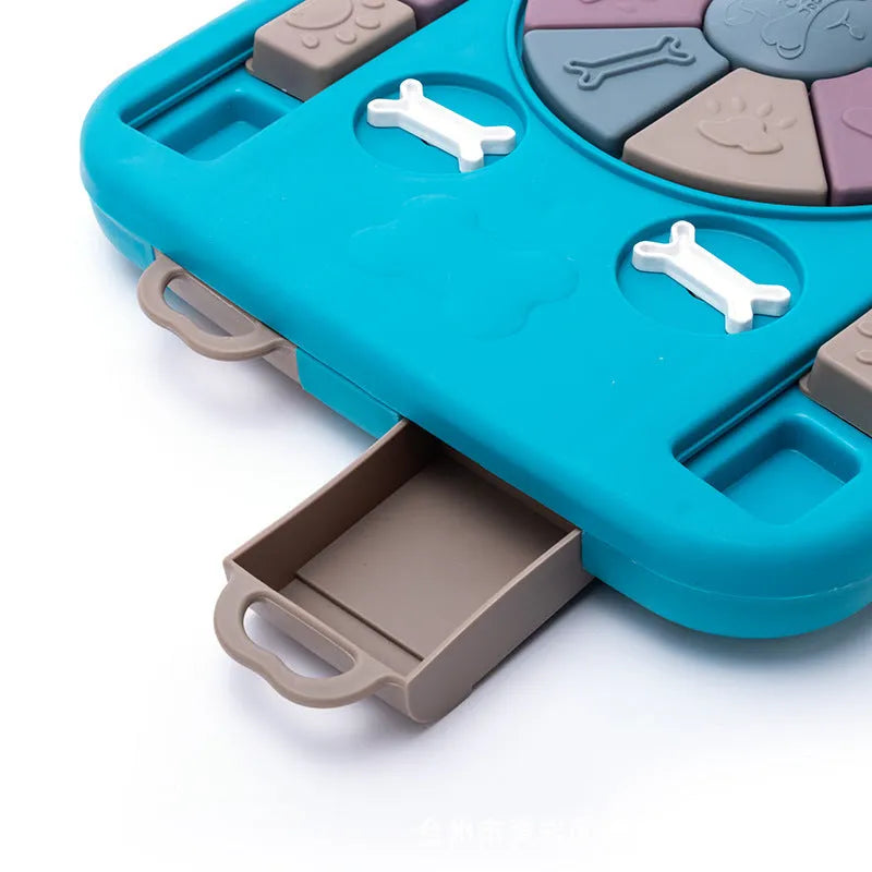 Blue interactive dog puzzle toy with four lockable handles, sliding panel and anti-skid base