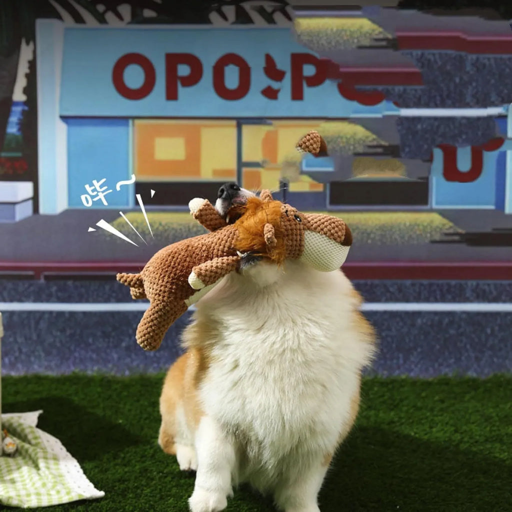 Animal-shaped plush dog toy with corn kernel texture for dental cleaning and squeeze-activated sound