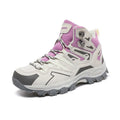 Men's and women's flannel hiking sneakers in various colours on a rocky outdoor path.