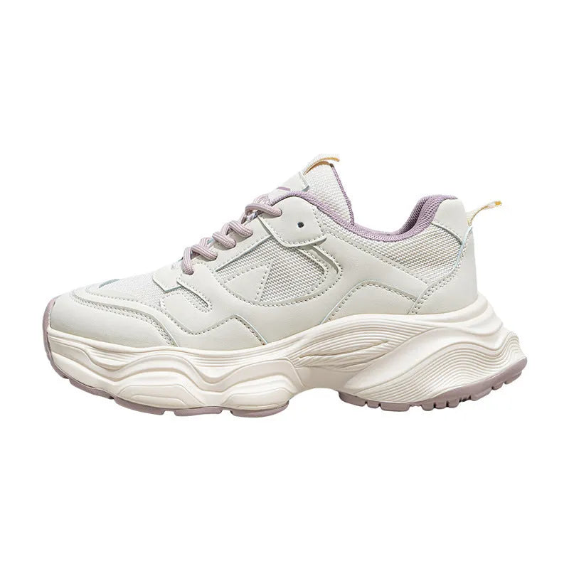 Women's breathable mesh white sneakers with flat heel, round toe, and lace-up closure