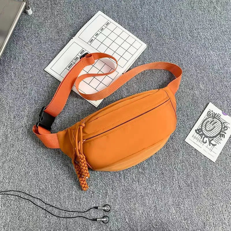 Men's black polyester chest bag shown as a crossbody bag with 35cm width