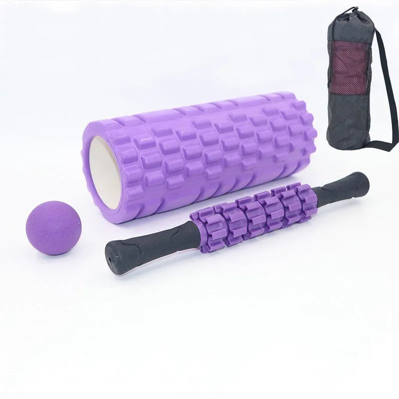 Black six-piece foam massage roller stick with gear design, 33cm long.