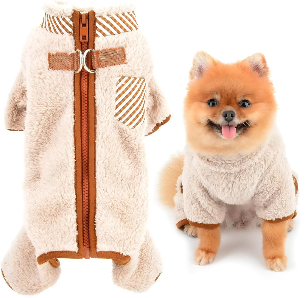 Small dog wearing green fleece coat with back zipper and D-rings, four-legged jumpsuit style